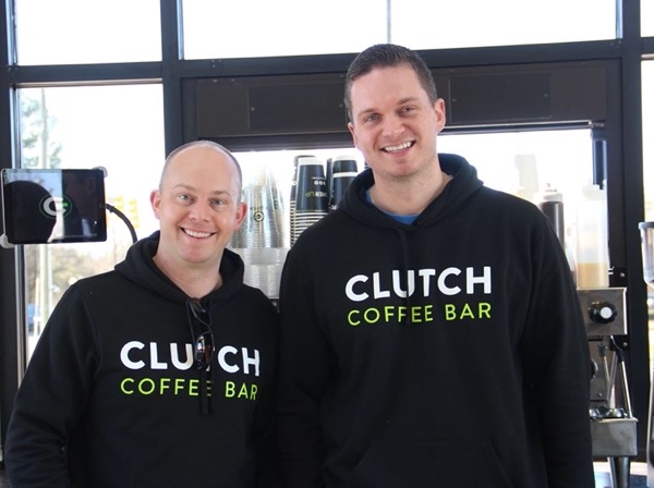 Plate IQ Clients Clutch Coffee Bar Operators pose in shop