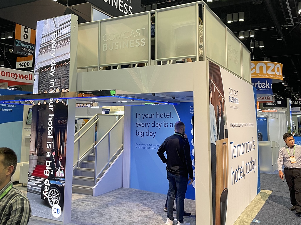 Interactive two-story trade show booth in Orlando Florida, at HITEC, hospitality industry convention 2022.